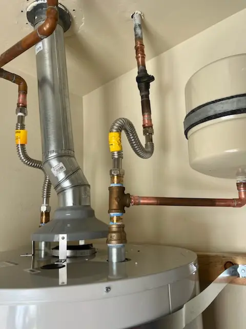 Water heater installation and plumbing repair in Rainey